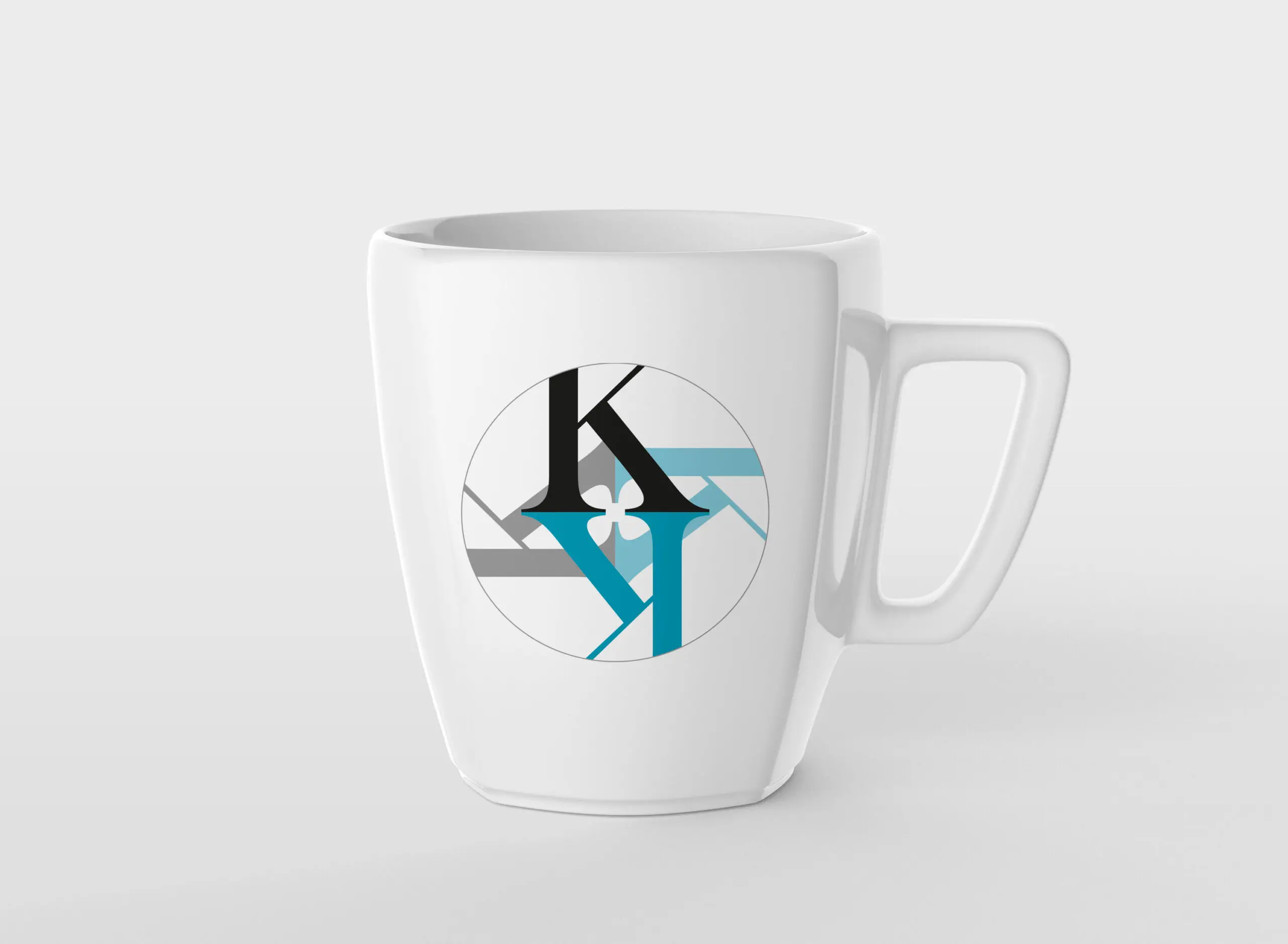 Grafisk profil för Kompani Kalejdo, kopp med logo